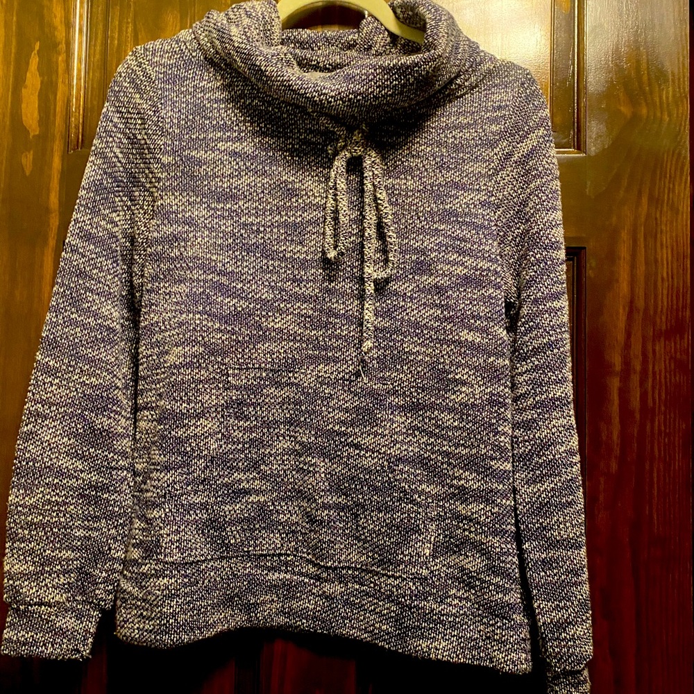 Pull over sweater with pink, grey and white colors.